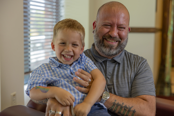 A Minnesota Freemason and his son enjoying a fun moment of laughter